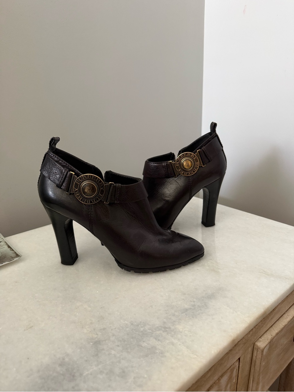 Burberry Vintage Black Leather Heeled Ankle Boots with Branded Medallion